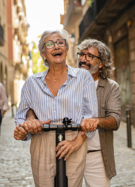 istock Modern senior couple with electric scooter 1458540732