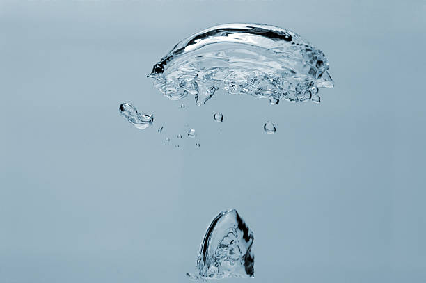 istock isolated air-bubbles rising in the water 145854193