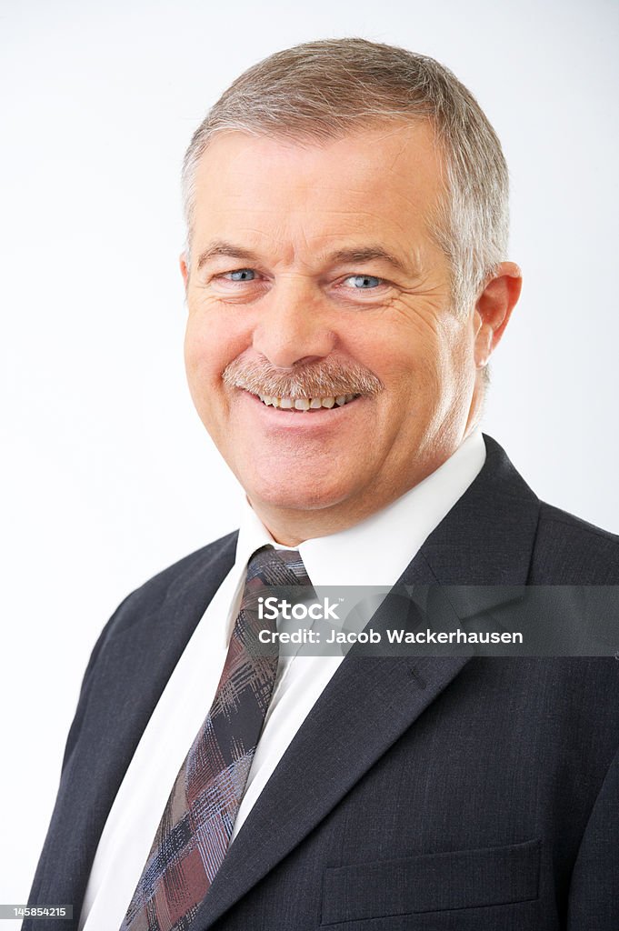 Close-up of a senior businessman smiling Achievement Stock Photo