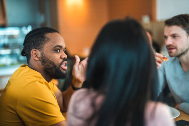 istock Friends Catching Up In Local Bar 1458547671