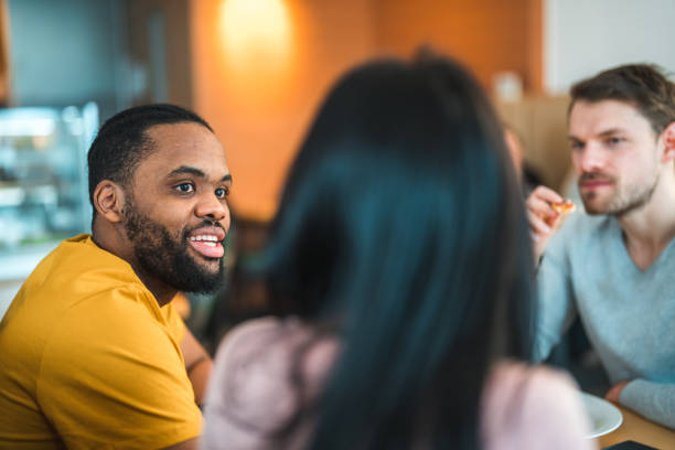 istock Friends Catching Up In Local Bar 1458547718