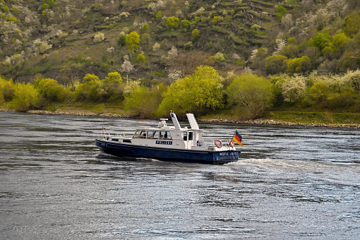 Mannheim, Germany - April 2022: Police patrol boat on the River Rhine,