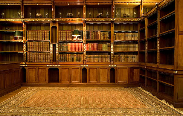 Empty reading room Retro reading room with old books library stock pictures, royalty-free photos & images
