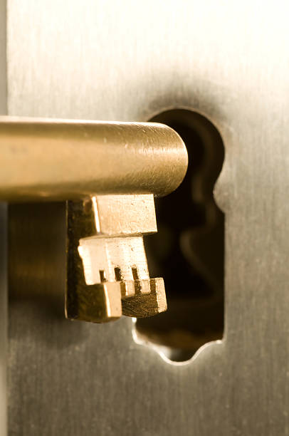 istock Golden key in a keyhole 145855082