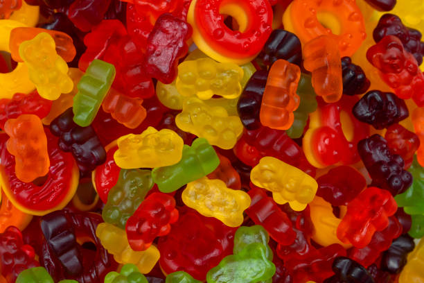 istock Assorted colorful gummy candies. Jelly donuts. Jelly bears. 1458554474
