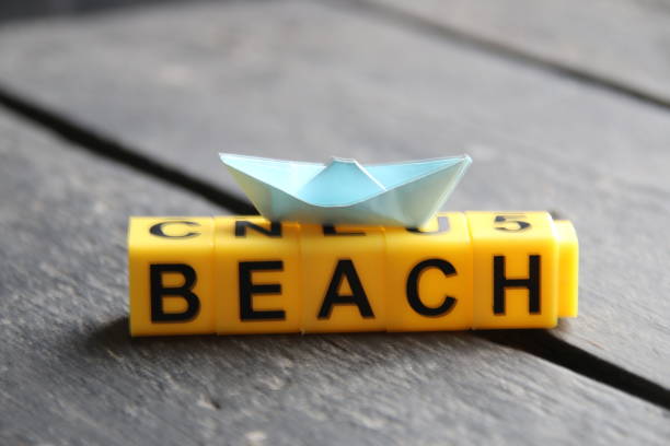 istock Beach concept, inscription on yellow cubes. 1458554601