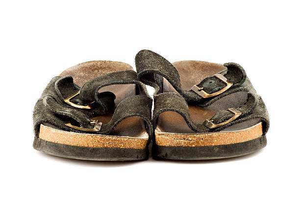 istock Old grungy sandal isolated on white background 145855713