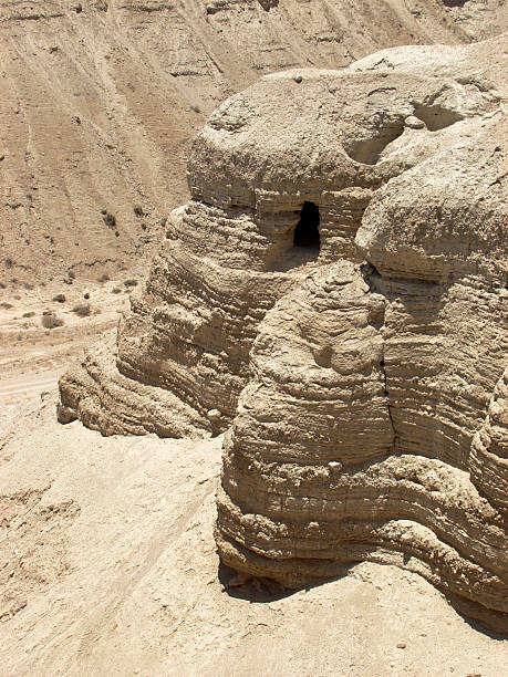 Qumran Cave where Dead Sea Scrolls found The famous Qumran Caves on the Western shores of the Dead Sea in Israel where the Dead Sea Scrolls were first discovered in 1947. dead sea scrolls stock pictures, royalty-free photos & images