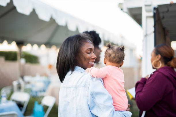 istock Mother holding small child 1458563512