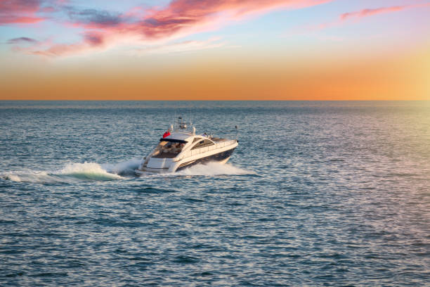 istock Luxury motor yacht on the ocean at sunset 1458568729