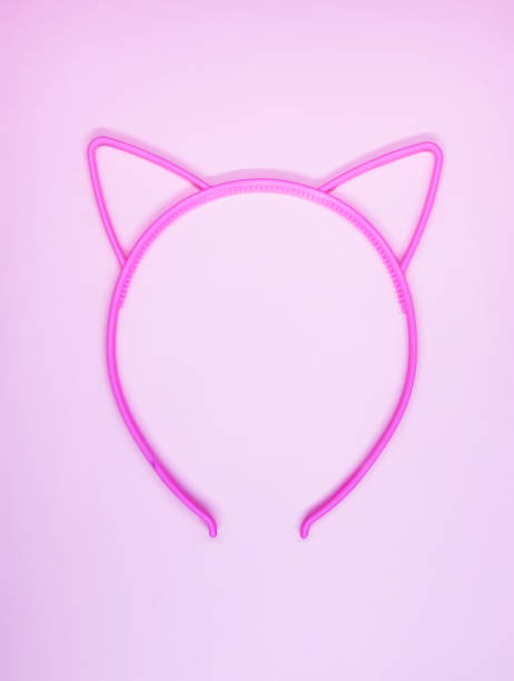 istock Pink plastic hoop with cute ears for hair. 1458568807