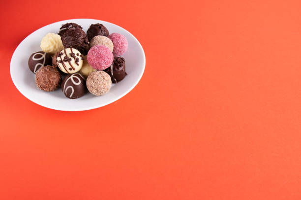 istock photo chocolate sweets in a round plate 1458568816