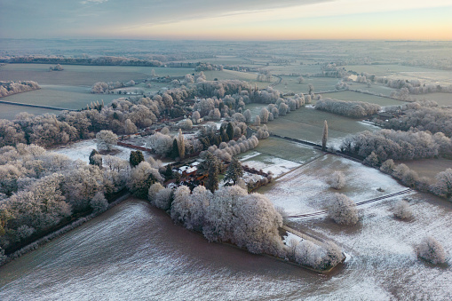 Wide angle aerial view of winter hoar frost over the English countryside, Staffordshire, UK.
