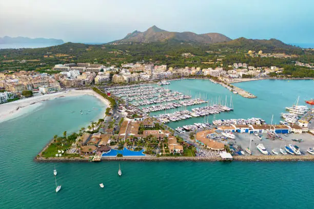Wide angle aerial view of Alcudia port and beach on the Balearic Island of Majorca, Spain, Europe
