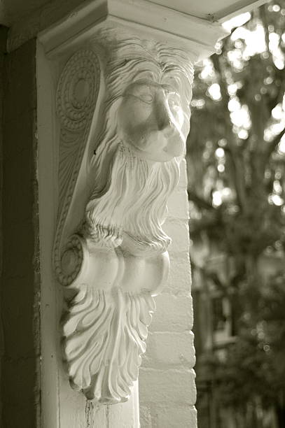 Lion face corbel on Victorian home in Savannah, Georgia stock photo