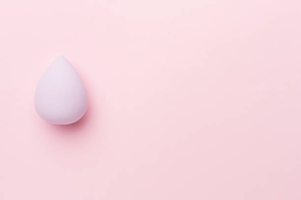 istock Beauty blender on color background, top view 1458579940