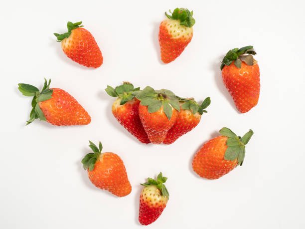 istock Ripe strawberries on a white background. Strawberries close up. 1458593436