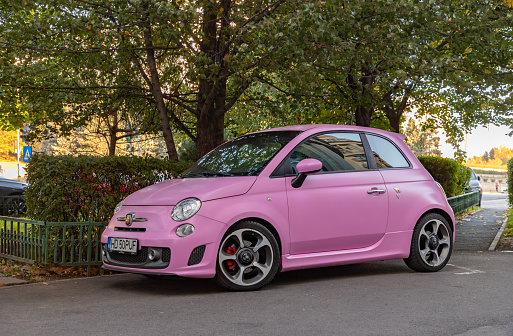 Bucharest, Romania - October 23, 2022: A picture of a pink Abarth 500.