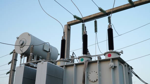 istock Power transformer. Electrical equipment. Electric substation. High voltage transformer against the blue sky. Electric current redistribution substation 1458602911