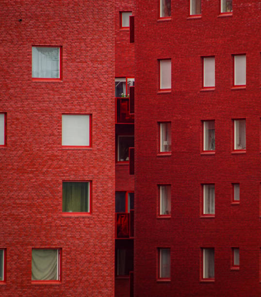 istock Full frame shot of red modern building 1458602976