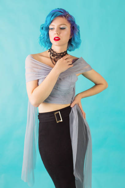 istock Girl with blue hair in studio 1458603815