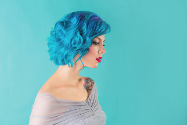 istock Girl with blue hair in studio 1458603849