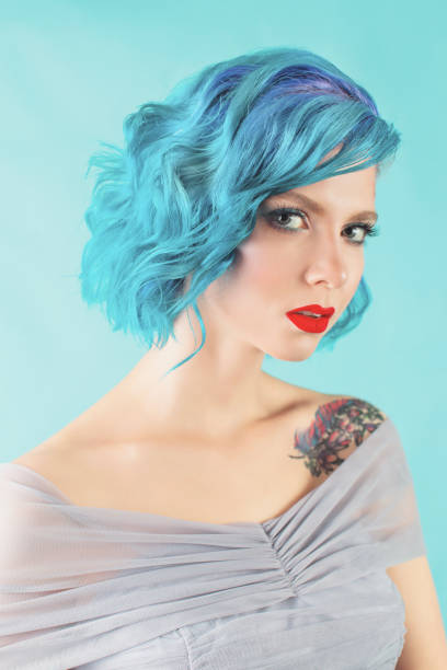 istock Girl with blue hair in studio 1458603881