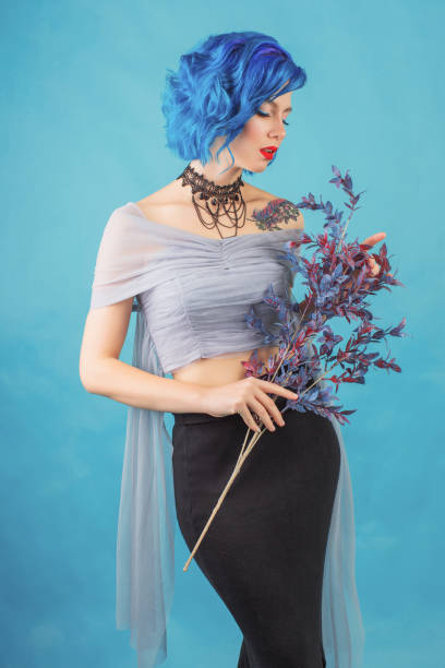 istock Girl with blue hair in studio 1458603909