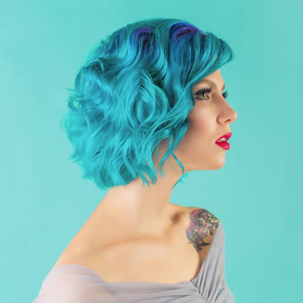 istock Girl with blue hair in studio 1458603947