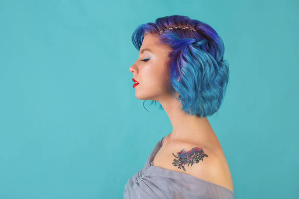 istock Girl with blue hair in studio 1458604081