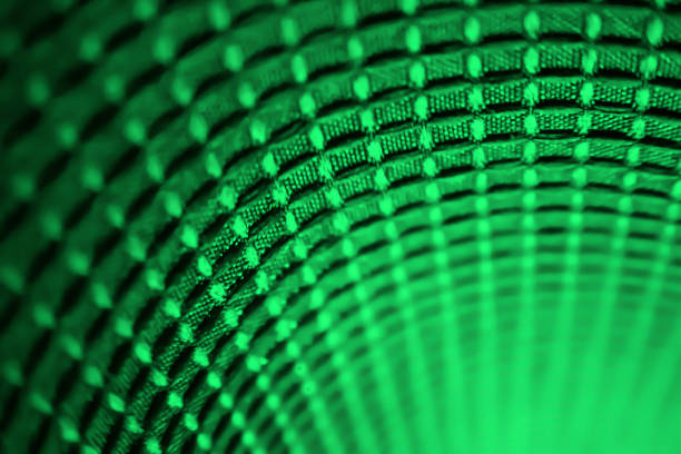 An abstract image of macro textile material is bent and fades towards the bottom. There is copy space at the bottom right.  There is a 3D effect with the bending of the material.