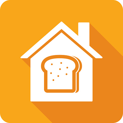 Vector illustration of a house with bread icon against an orange background in flat style.