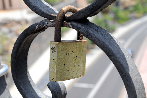 A Colored Metal Lover's Lock on a Bridge