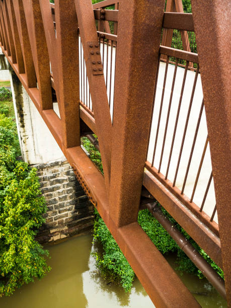 istock Metal Bridge Rail Rusted Color With A River Under 1458612226