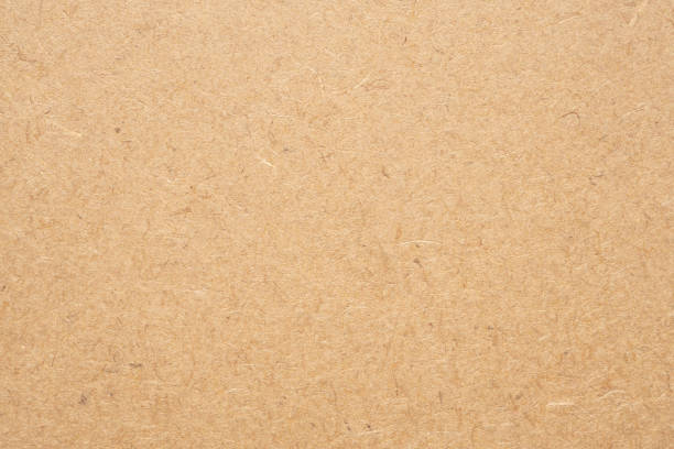 istock Old brown recycle cardboard paper texture background 1458613489
