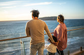 Family looking to the landscape during a cruise travel