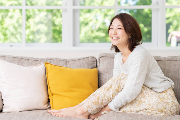 istock attractive asian woman relaxing 1458619853