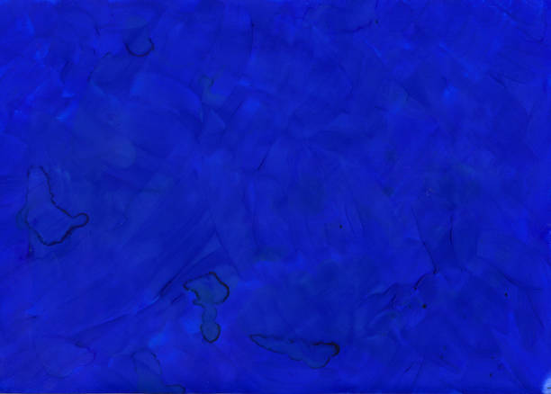 istock Bright  dark blue background with brush strokes of acrylic paint on white paper. Hand drawn illustration 1458630100