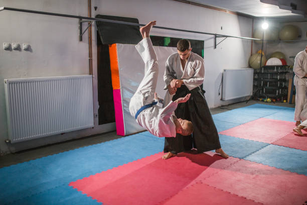 istock Young fighters learn self-defense in the gym 1458635580
