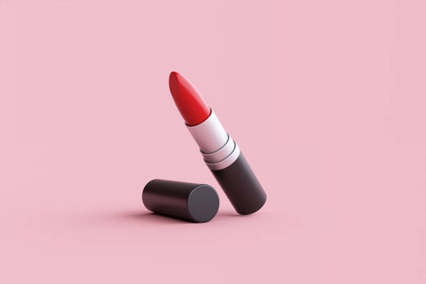 istock Red lipstick close-up on pink background 1458639342