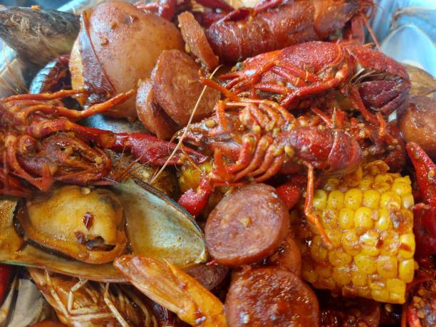 louisiana crawfish owoce morza gotować - crayfish new orleans cajun food louisiana zdjęcia i obrazy z banku zdjęć