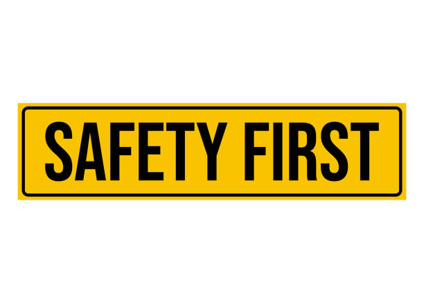 Safety first sign danger caution protection security banner construction symbol design vector illustration Safety first sign danger caution protection security banner construction symbol design vector illustration safety first stock illustrations