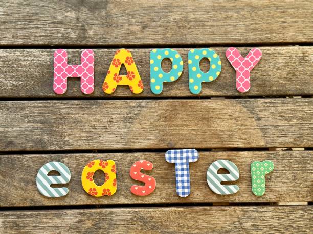 istock Happy Easter word  on wood 1458662740