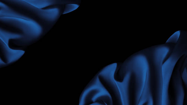 istock Blue satin fabric lays on the surface in the form of openwork folds, silk background, satin background 1458663911