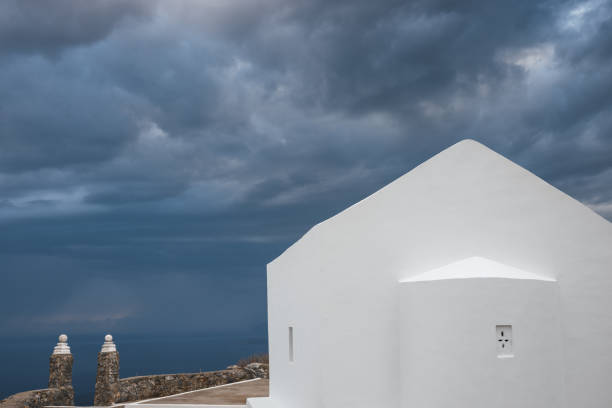 White Timios Stavros church on top of the mountain above Plakias, Crete.