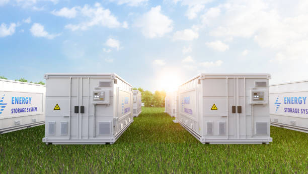 Energy storage systems or battery container units on field stock photo