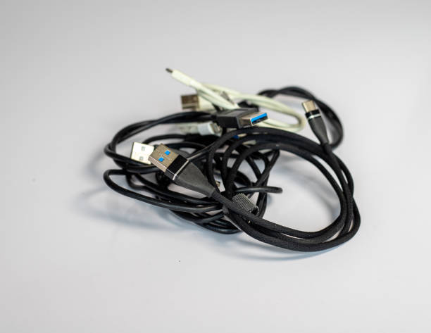 istock Various type os charging wire for mobile phones isolated white background 1458668709