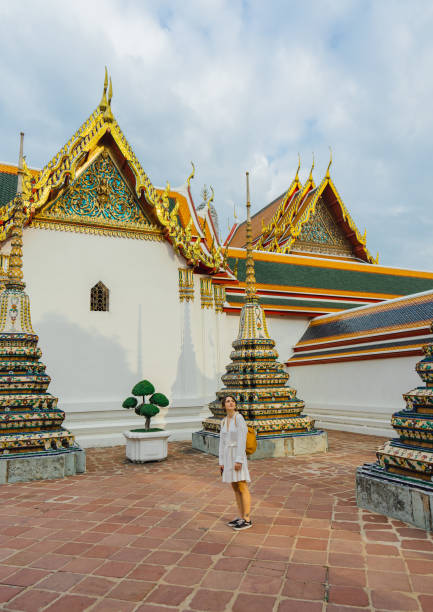 istock Woman exploring  Wat Pho in Bangkok 1458670265