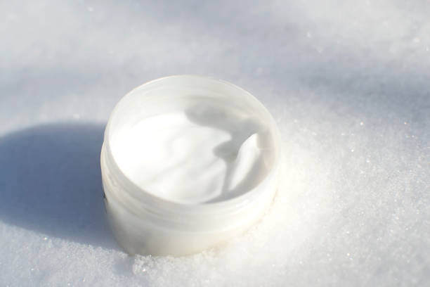istock jar of cream in the snow 1458672462