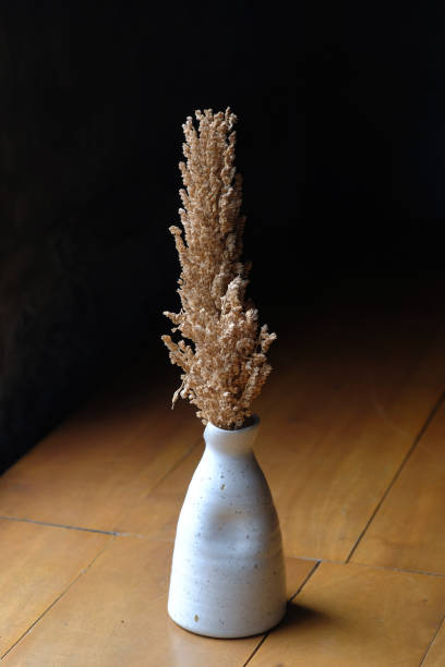 istock Dried flowers in a vase as a room decoration 1458675143